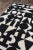 Classic motifs meet contemporary symmetry in the modern style of this handmade area rug collection. Repeating geometric...