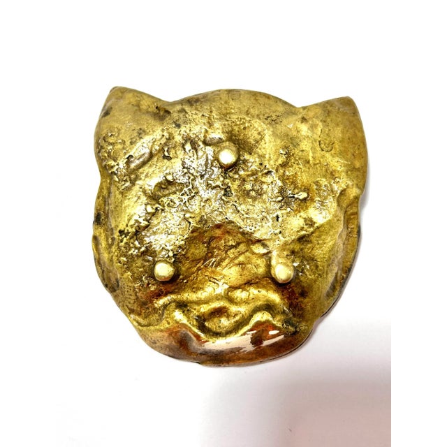 A wonderfully sculptural vintage brass trinket dish formed as a detailed cat’s head. The expressive face and textured fur...