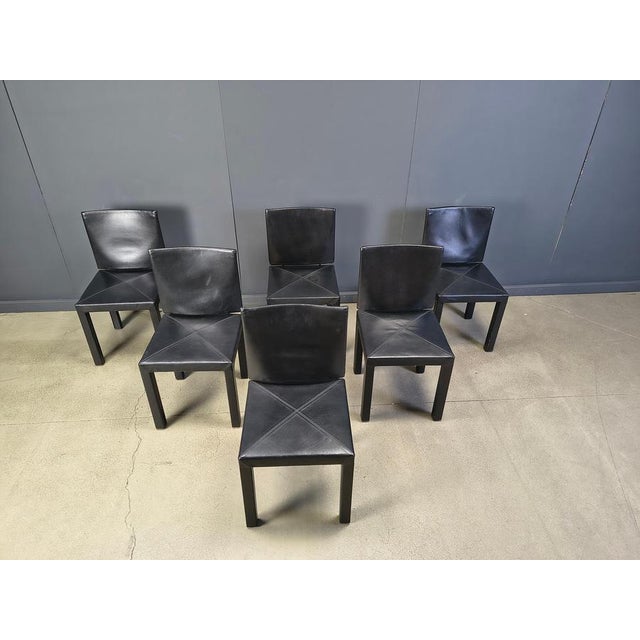 Set of 6 Arcadia dining chairs designed by Paolo Piva for B& B italia's Arcadia series. Upholstered in black leather. They...