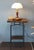 Handmade two-tier side / end table by Live One's, Wake Forest, North Carolina. Solid American black walnut top and lower...