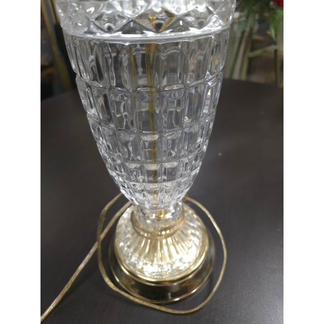 Striking Hollywood Regency table lamp, an elegant blend of glamour and sophistication. The lamp showcases a geometric...