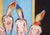 Attention all shoe lovers! This whimsical mixed media figurative abstract piece features four surrealist nude figures with...