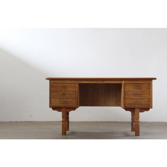 This finely crafted Brutalist Oak Desk from Denmark carries the quiet confidence of Danish mid-century design, echoing the...