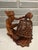 An extraordinary, highly detailed mid-century Balinese expressionist realism genre sculpture depicting a traditional...