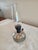 Vintage Miniature Oil Lamp, Clear Glass with Pierced Silver Metal Band. Oil lamp is in great vintage condition without...