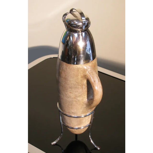 A rare Mid-Century Italian lacquered goatskin carafe by Aldo Tura. The beautiful goatskin is in a taupe color with a...