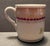 Late 19th century lusterware cup, with maroon, light yellow and gilt decoration; inscribed "For a Friend." Combined...