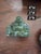 Little Chinese jewelry box, carved round stone incense burner with lid, and serpentine carved Buddha.