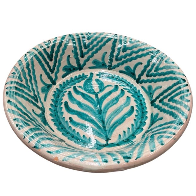 Bring a touch of authentic artisan heritage into your space with this stunning vintage ceramic lebrillo. Hand-crafted and...