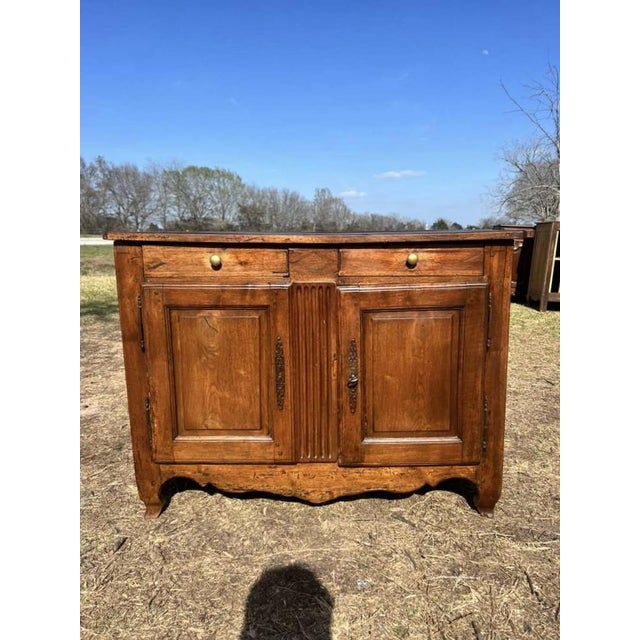18th Century French country provincial Louis XV Solid Walnut sideboard made of solid walnut the wood has been finished...