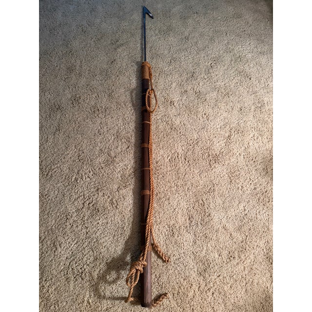 A vintage nautical harpoon from Johnson & Joseph Co. originates from a prominent historical Pacific Coast ship chandlery...