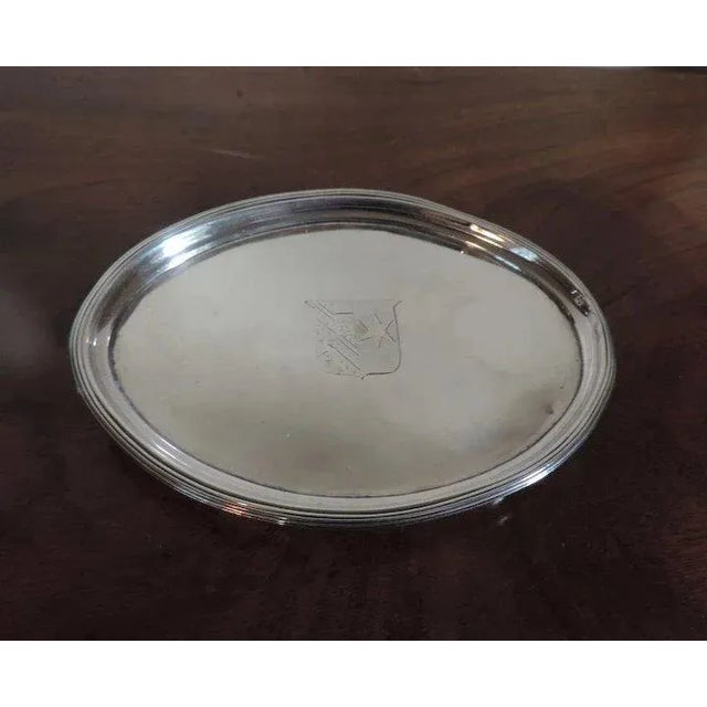 Antique 19th c. English sterling silver oval tea pot stand weighted with a wooden base. The thick base prevents hot items...