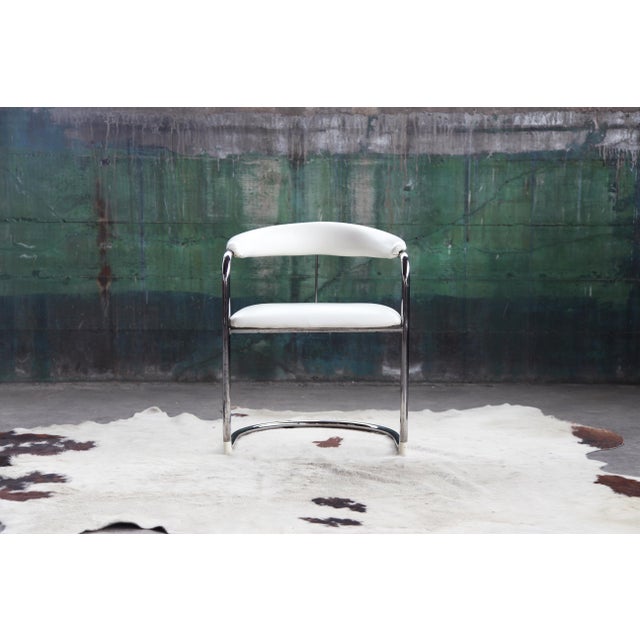 Stunning Anton Lorenz for Thonet Cantilevered Armchair in white. This is the Perfect opportunity to purchase just one as...