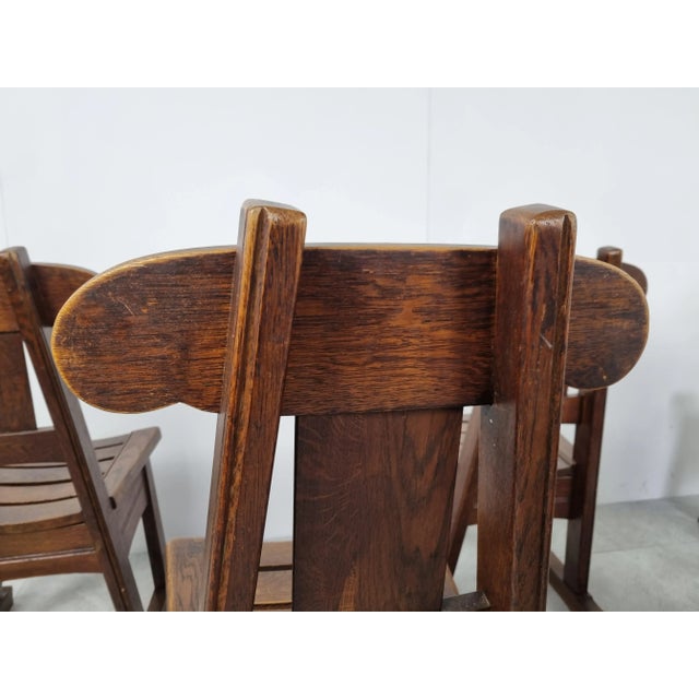 Mid-century solid elm wood brutalist dining chairs. Beautiful, timeless design with sledge bases/feet. Good original...