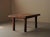 This table perfectly illustrates the transitional design of the 1940s, at the crossroads of modernist restraint and Art...