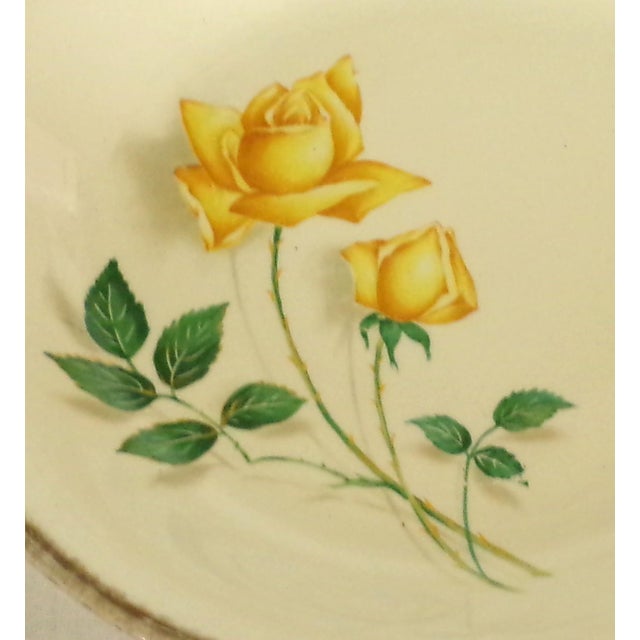 The Simplicity Dinnerware, by Canonsburg Pottery, setting for 8 in the Yellow Rose Pattern includes a set of round plates...