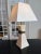 Beige and gold enameled ceramic lamp signed Le Dauphin. Original lampshade, stains to be reported. Base height 47cm Width...