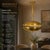 Elevate your dining space with this stunning Dual Brass Disc Chandelier, a perfect blend of mid-century modern style and...