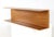 This stylish wooden wall shelf is designed in the Danish Design style. The warm wood and clean lines perfectly complement...