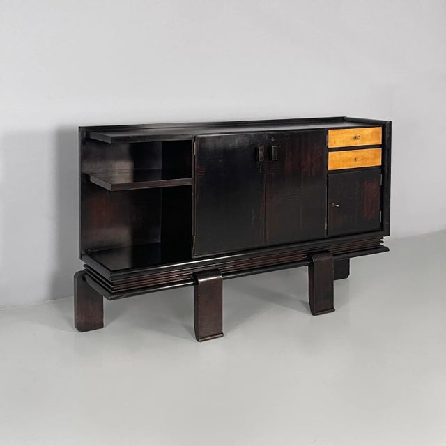 Italian Art Deco sideboard in dark and light wood, 1930s Rectangular sideboard made entirely of light and dark wood. The...