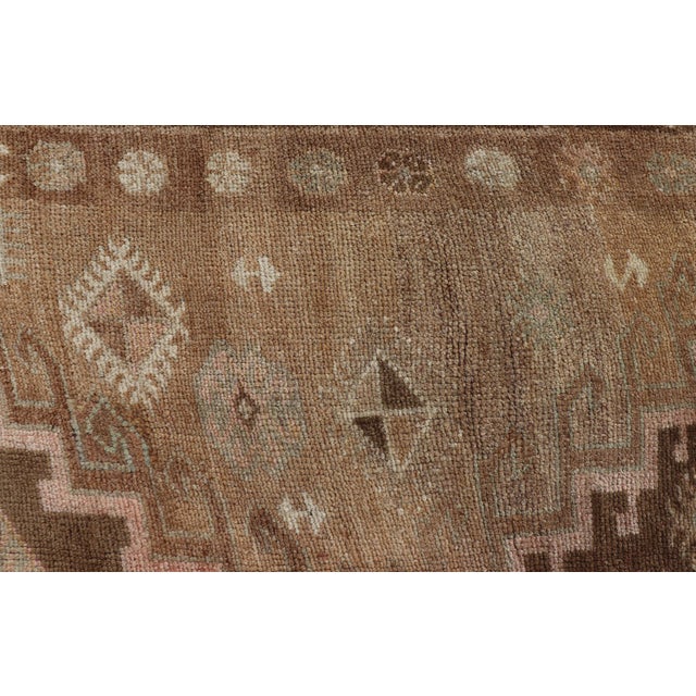 Vintage Turkish Kars Gallery Rug With Warm Brown and Soft Pastel Accents For Sale - Image 9 of 11