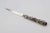 Letter opener in silver bronze Silver plated bronze letter opener 35/42 microns Measures: L: 218 mm, weight: 118 gr This...