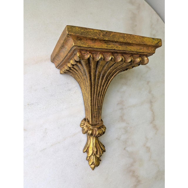 Vintage French Provincial style gilt decorative wall sconce.