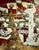 Bold fields of red dominate this tall canvas, applied over Stella's gold leaf ground in thick, confident strokes that...