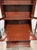 This elegant piece is a classic Chippendale-style secretary desk crafted from mahogany that can serve as a functional...