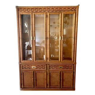 1980’s Rattan Wrapped Faux Bamboo Lighted China Cabinet For Sale