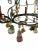 Copper Vintage Wrought Iron Chandelier Decorated with Pendants of Various Shapes and Sizes and a Floral Theme For Sale - Image 8 of 9