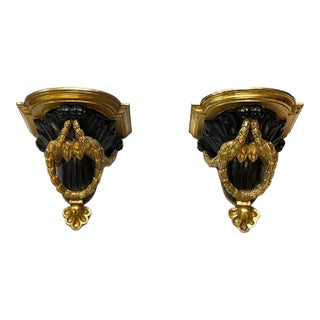 Neoclassical Gilt and Ebonized Wall Brackets - A Pair For Sale