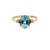 Elegant Blue Topaz and Diamond Ring in 14K Yellow Gold A beautifully crafted ring featuring a vivid faceted oval blue...