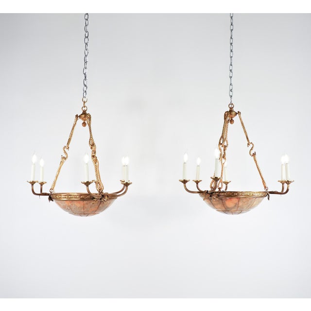 Crafted during the height of the early 20th-century revival, this exceptional pair of chandeliers utilizes premium raw...