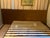 Custom Wall to Wall Velvet Headboard and Walnut King Sized Bed Frame For Sale - Image 9 of 13