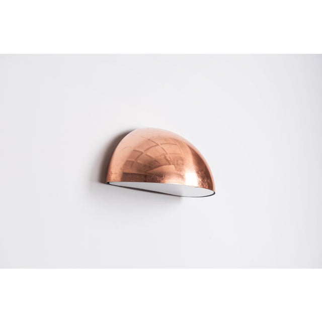 A striking vintage wall lamp by horn belysning, featuring a beautifully proportioned half-dome shade crafted from copper....