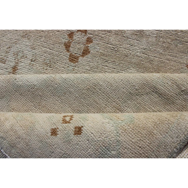 Muted Oushak Hand Knotted With All-Over Tribal Design in Light Tones of Taupe and Browns For Sale - Image 10 of 12