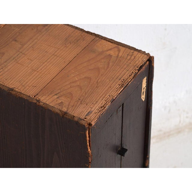 Antique japanese single-door cabinet made of japanese cedar (cryptomeria japonica), dating from the late meiji period to...