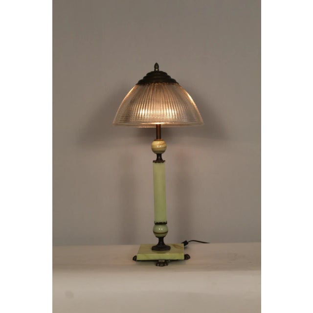 Unusual Akro agate table lamp. Consisting of Akro agate fittings are a vibrant lemon hues with flaxen tones. and cast...