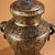 This stunning vessel is masterfully crafted from heavy solid bronze with a rich, mottled green and brown patina. It...
