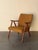 Beautiful vintage lounge chair crafted in solid teak, made in Denmark. This piece features classic Mid-Century Modern...