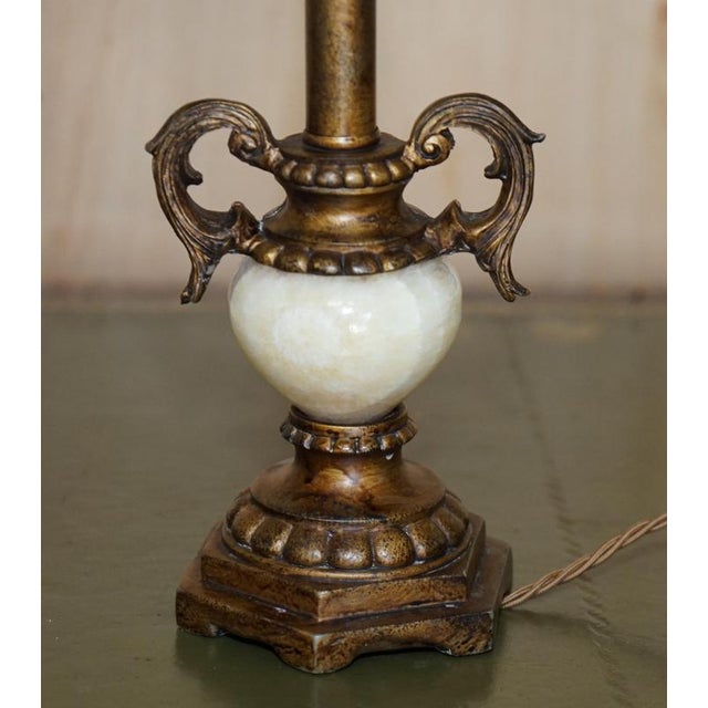 Lovely vintage circa 1960's hand carved table lamp with bronzed light fitting and marble sphere to the base A very good...