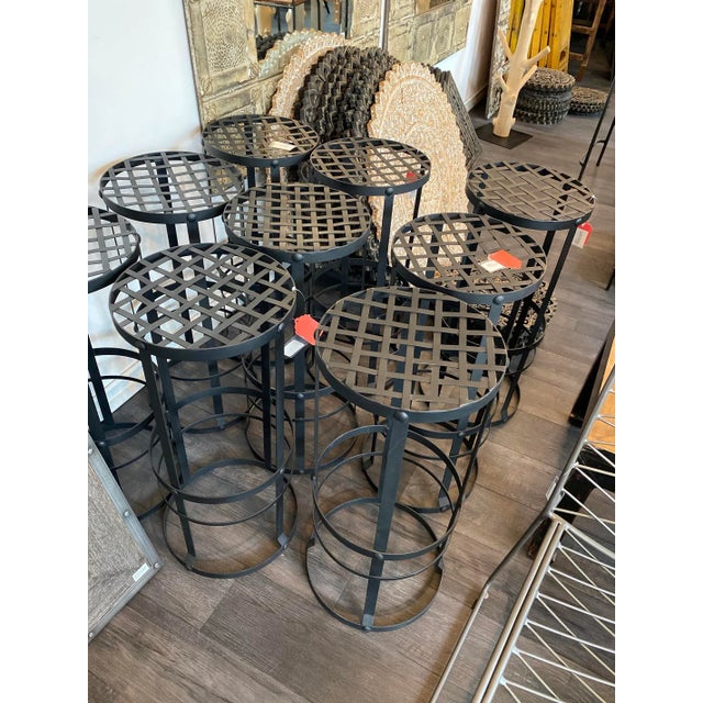 Woven basket style seat round iron bar stool with blackened finish. Great for indoor or outdoor use (material will...