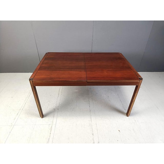 Mid century dining table model '4D' designed by Angelo Mangiarotti for Molteni. The table is made out of a beautiful wood,...