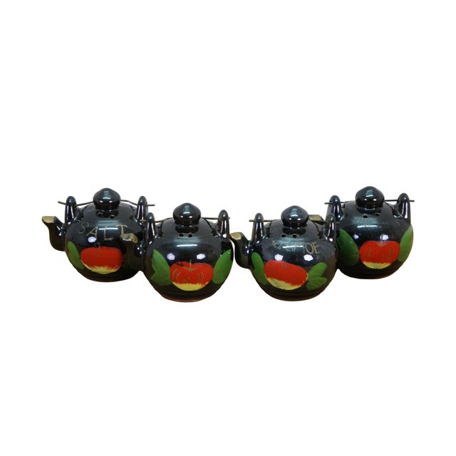 Vintage Japanese Relco redware kitchen set featuring a black-glazed teapot wall pocket / spice rack with four matching...