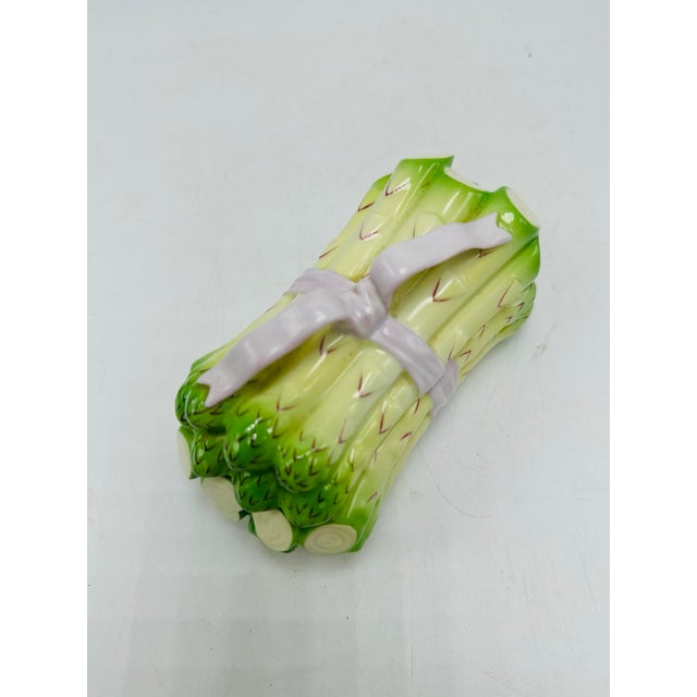 This is a hand-painted porcelain piece crafted by Herend, a world-renowned Hungarian porcelain manufacturer known for its...