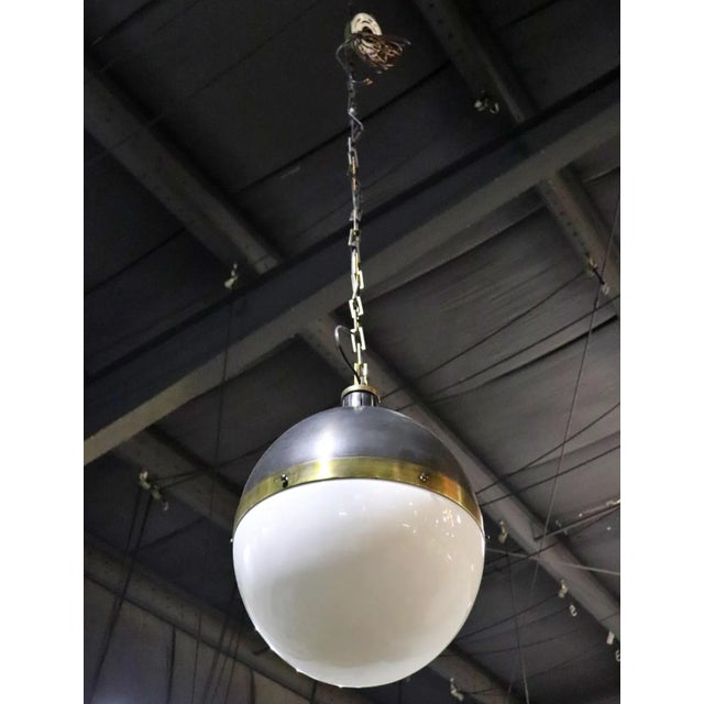 Glass. Mixed metal. Not counting chain measures 23" h x 17 1/2" diameter. Condition Scratches. Oxidation. We recommend...