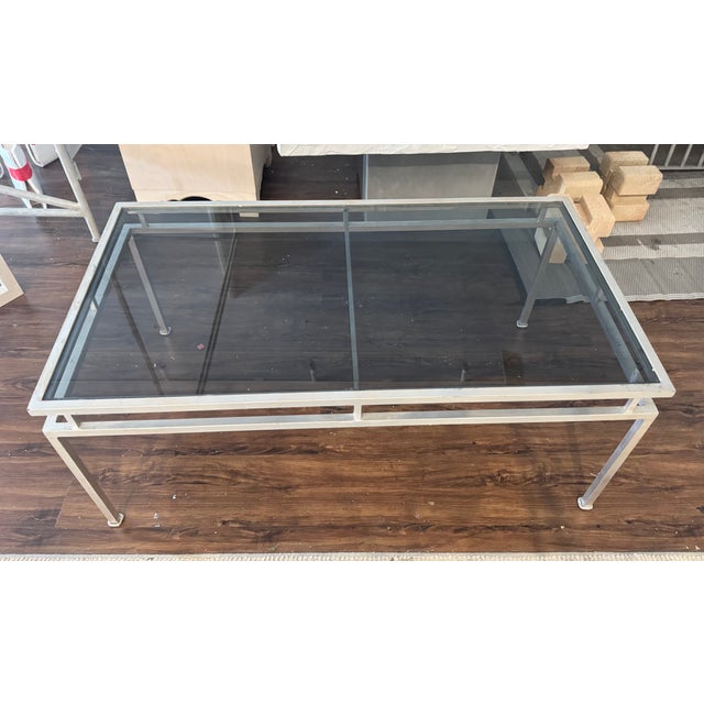 This sleek silver leafed coffee table will add style to any living room , family room, library, or office. Aged silver...