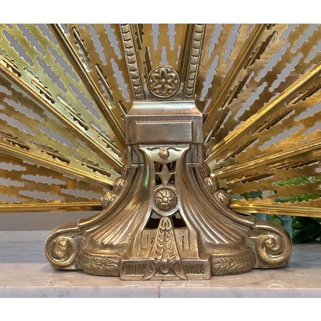 This is for a wonderful Vintage brass "peacock fan" fireplace screen. It looks lovely open and yet still very decorative...