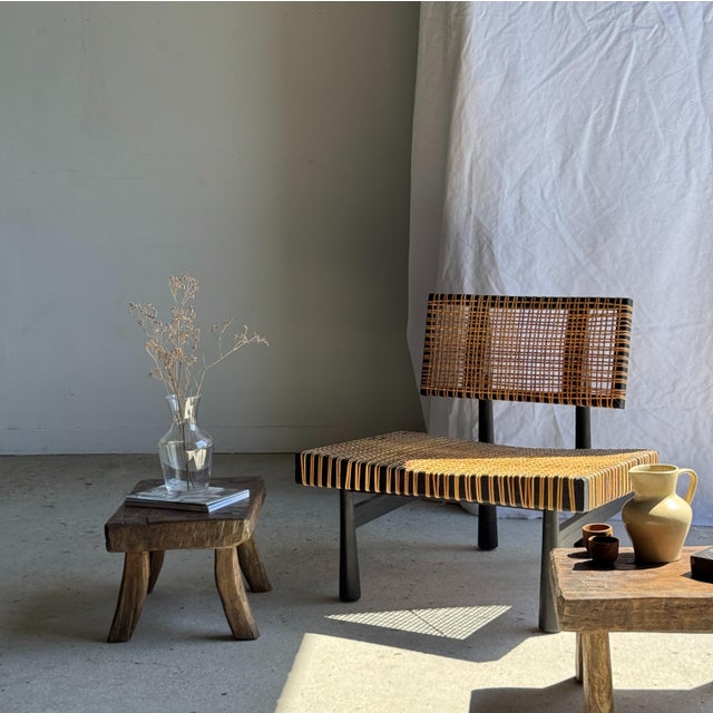 Small rectangular teak stool with wabi-sabi style arched legs. Minimalist, raw design; a beautiful piece (thickness and...